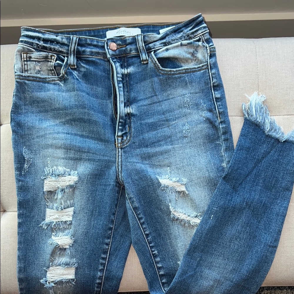 Signature Distressed Denim Skinny Jeans